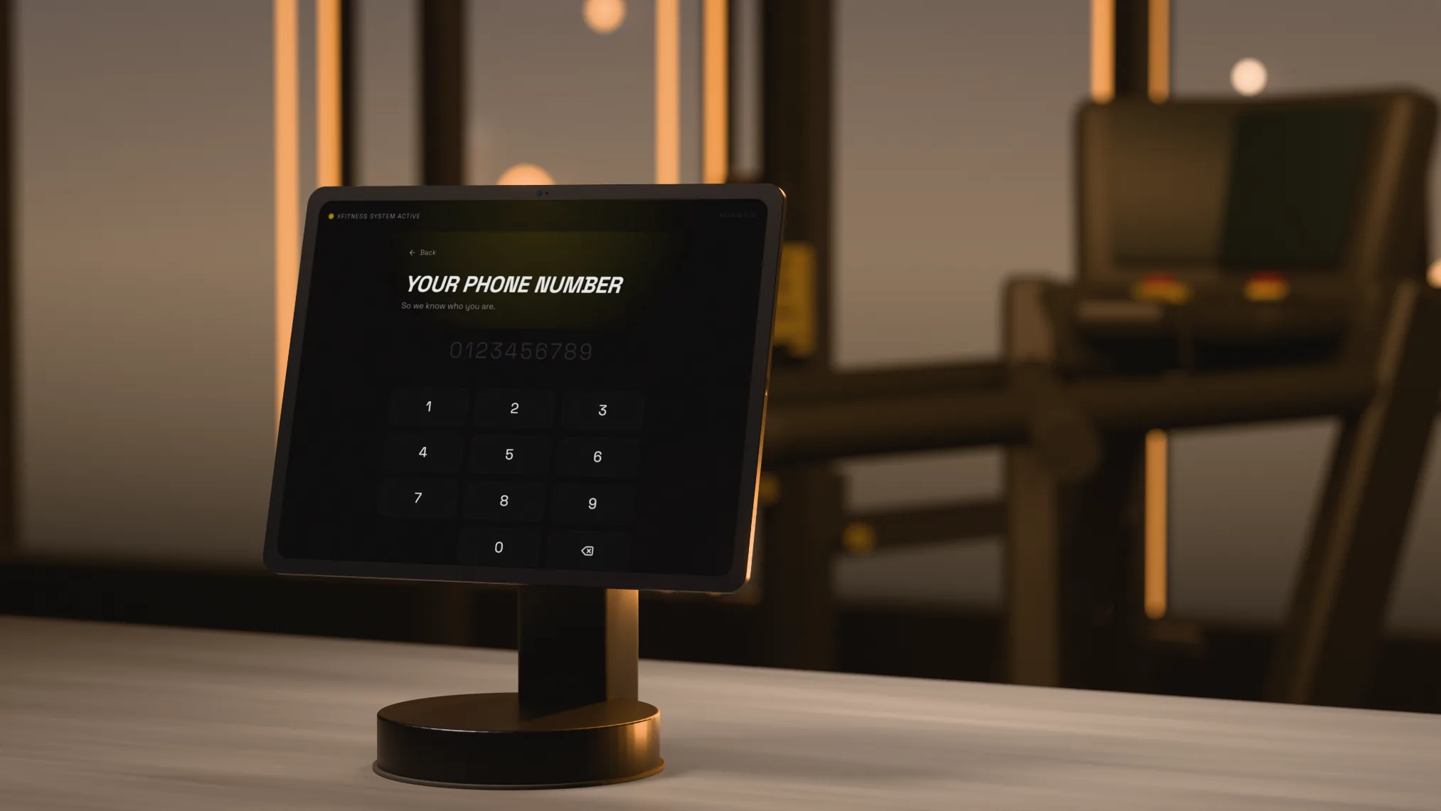 Render: the real XFitness check-in screen on a rendered counter tablet